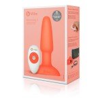 Анальная премиум вибро-пробка с римминг эффектом и мотором в головке Rimming Plug - оранжевая - 14,5 см Анальная премиум вибро-пробка с римминг эффектом и мотором в головке Rimming Plug - оранжевая - 14,5 см