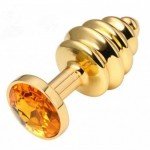 Малая анальная металлическая золотистая пробка Gold Spiral Small с рёбрышками и оранжевым кристаллом - 7 см