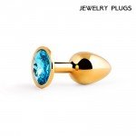 Малая анальная металлическая пробка Jewelry Plug золотистая с голубым кристаллом - 7 см