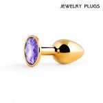 Малая анальная металлическая пробка Jewelry Plug золотистая с фиолетовым кристаллом - 7 см