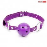 Кляп-шарик NoTabu с отверстиями на регулируемом ремешке с кольцами - фиолетовый