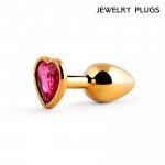 Малая золотистая анальная пробка Jewelry Plugs с малиновым кристаллом-сердцем - 7 cм